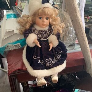 Elegant Purple and White Doll